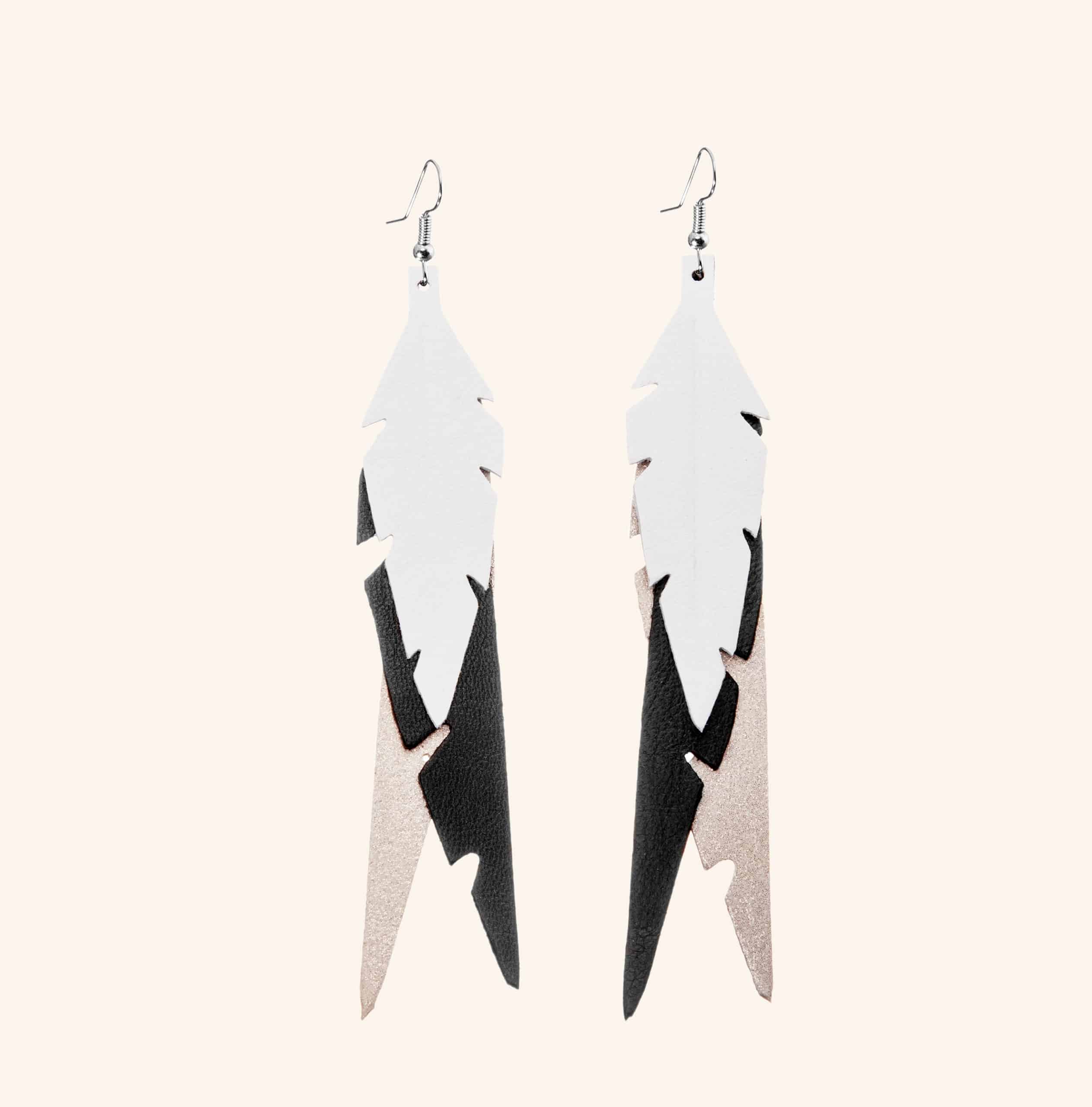 FEATHERS FAB WHITE BLACK GOLD scaled 1