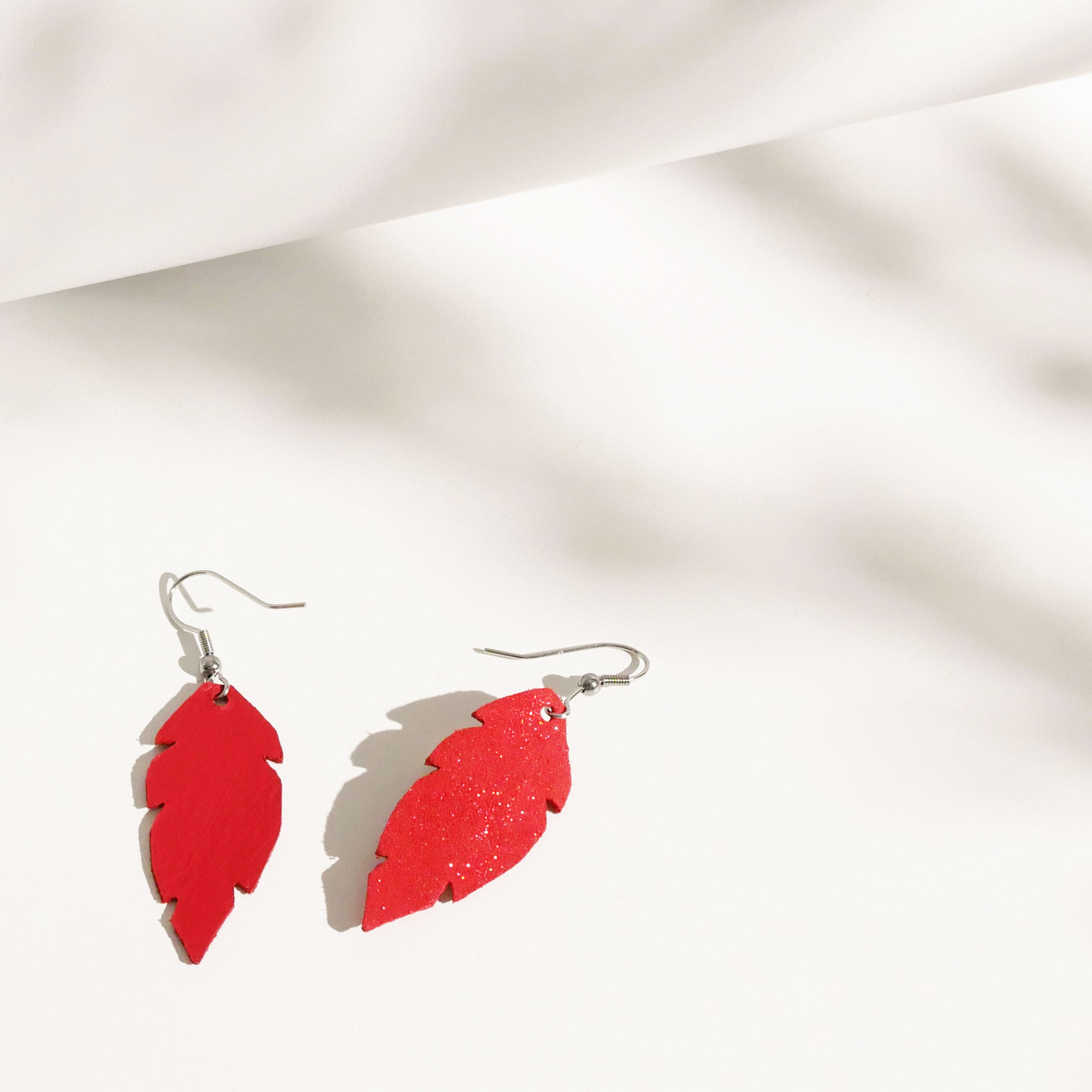 FEATHERS Petite Glitter Orange web